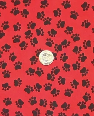 Black Paw Prints on Red Fabric by Hi-Fashion Fabrics, by Half Yard - Image 1 of 4