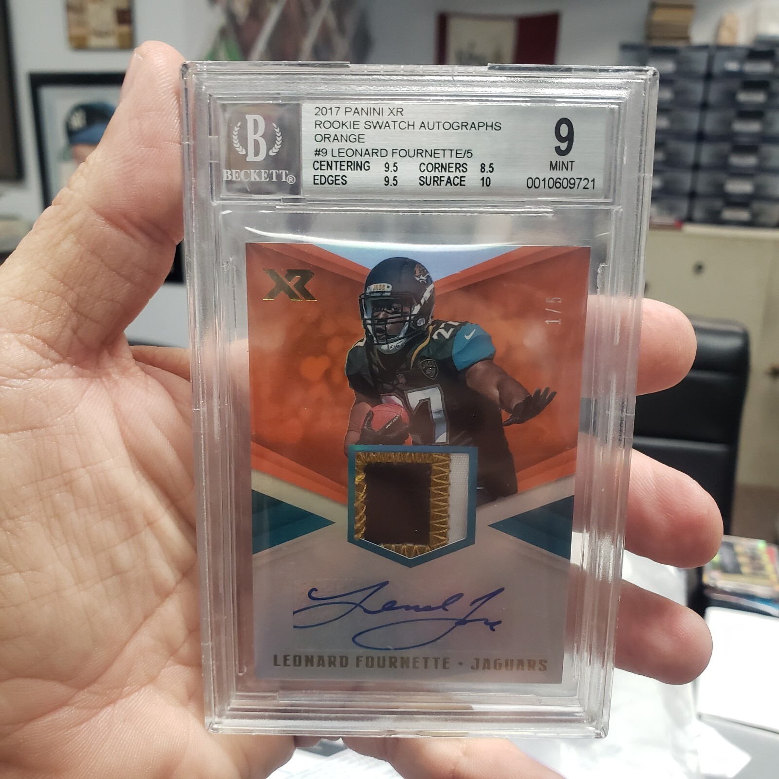 Leonard Fournette Panini XR Rookie Swatch Autographs #LF Magenta Print Plate 1/1