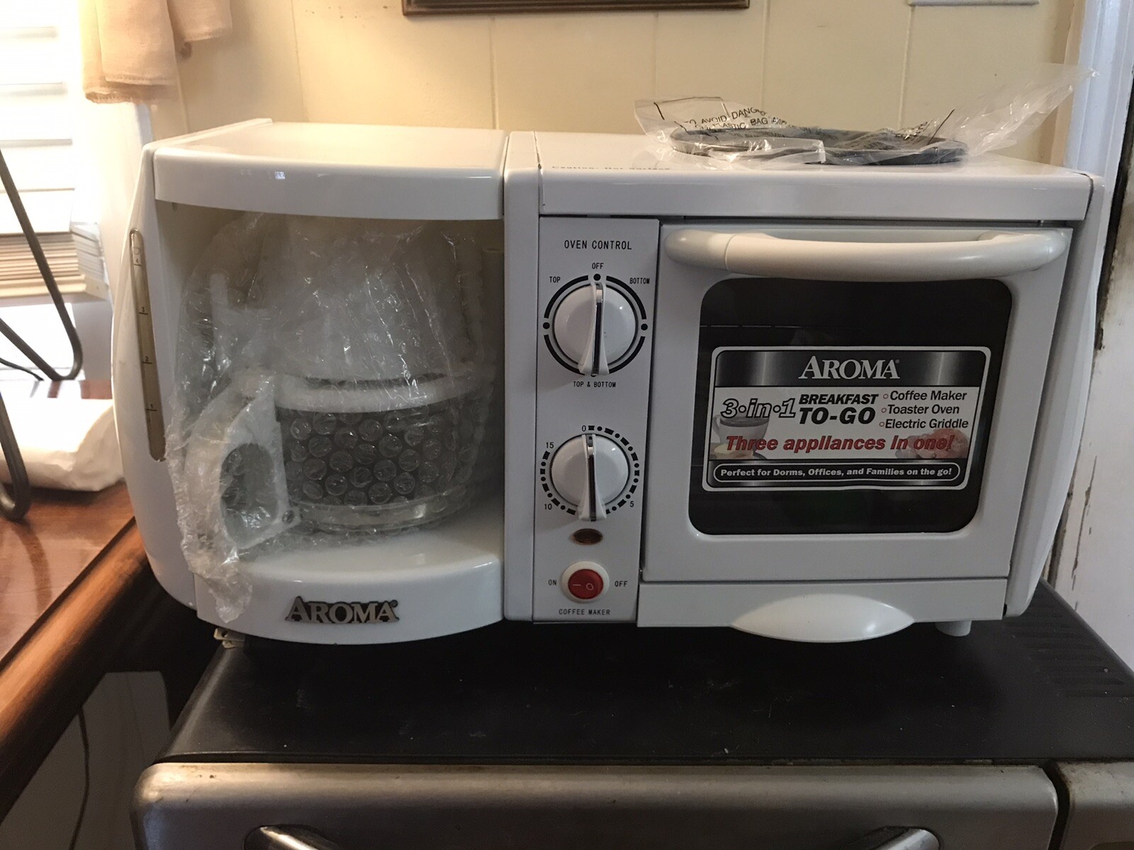 Aroma Breakfast-To-Go  3-in-1 Toaster Oven,Coffee Maker, Griddle Model ABT-103