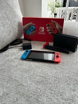 Nintendo Switch 32GB Konsole Joy-Con Neon Rot/Blau inkl. Dock & Netzteil PAL