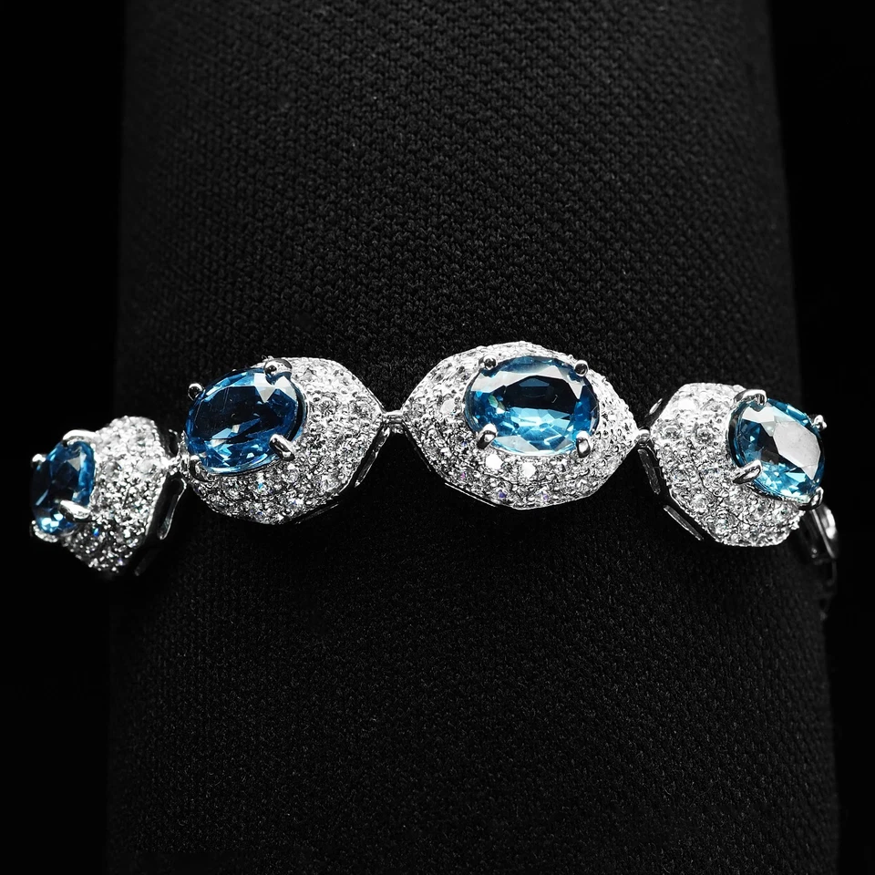 Bracciali in oro bianco con topazio blu svizzero radiante ovale in argento... - Immagine 3 di 4