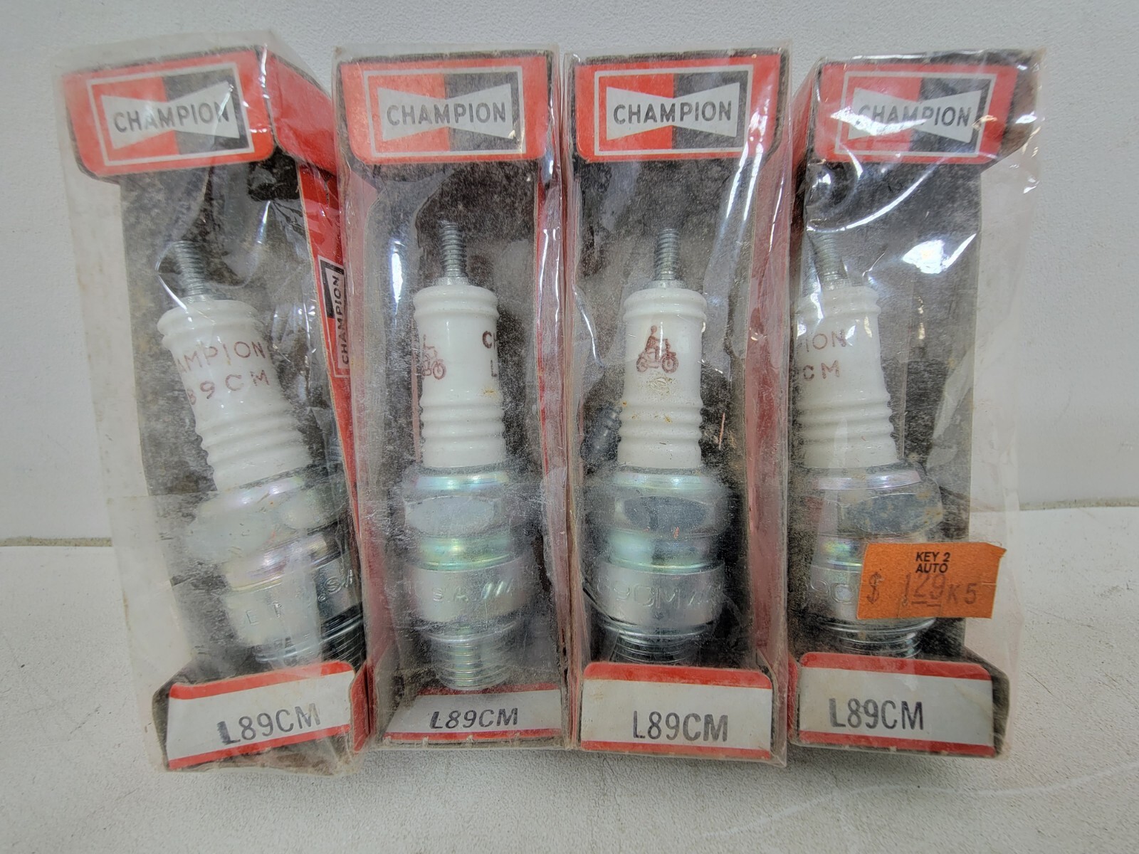 New 4 Pack of Champion L89CM L-89CM Spark Plug Moped Small Engine NOS