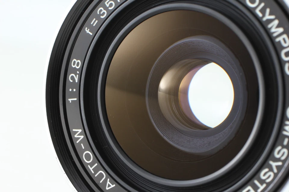 [Casi COMO NUEVO] Lente gran angular Olympus OM-SYSTEM ZUIKO AUTO-W 35 mm f/2,8 de JAPÓN Foto 2 de 4