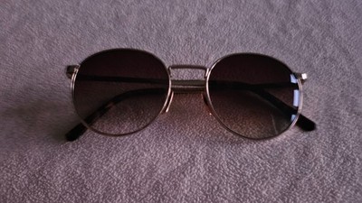 Viu Sonnenbrille Gold rundes Gestell. The Voyager. Mit Koffer.