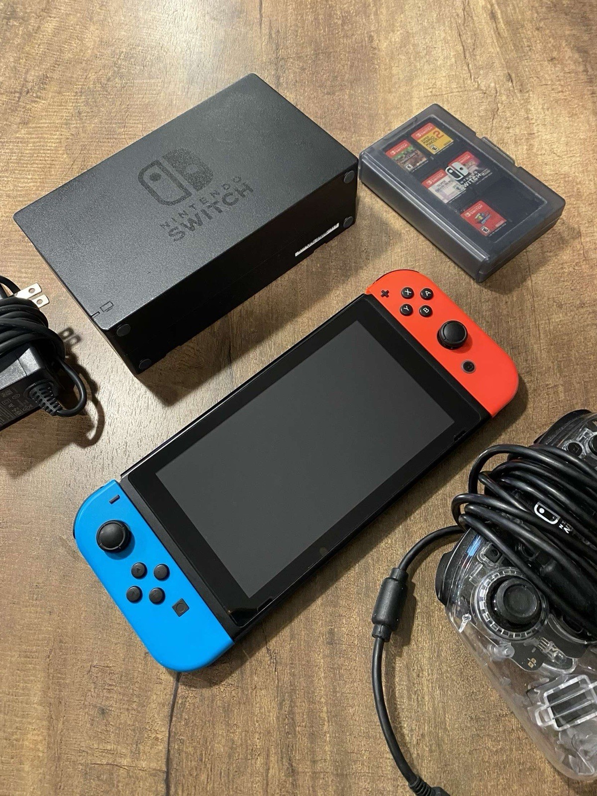 Nintendo Switch Console with Games (in Picture), Dock, And Controller.