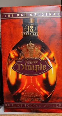 The Original Dimple 12 years old - deluxe Scotch Whisky.