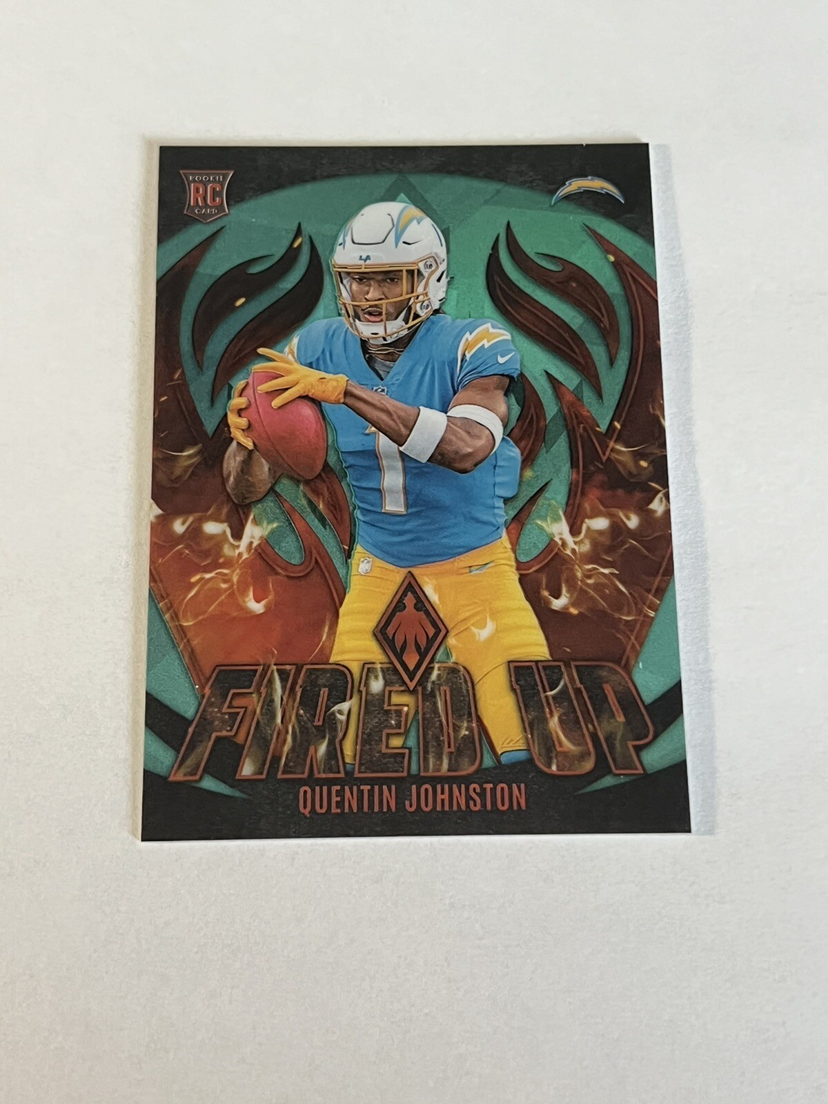 2023 Panini Phoenix Quentin Johnston RC Rookie Fired Up Teal Prizm SP /125