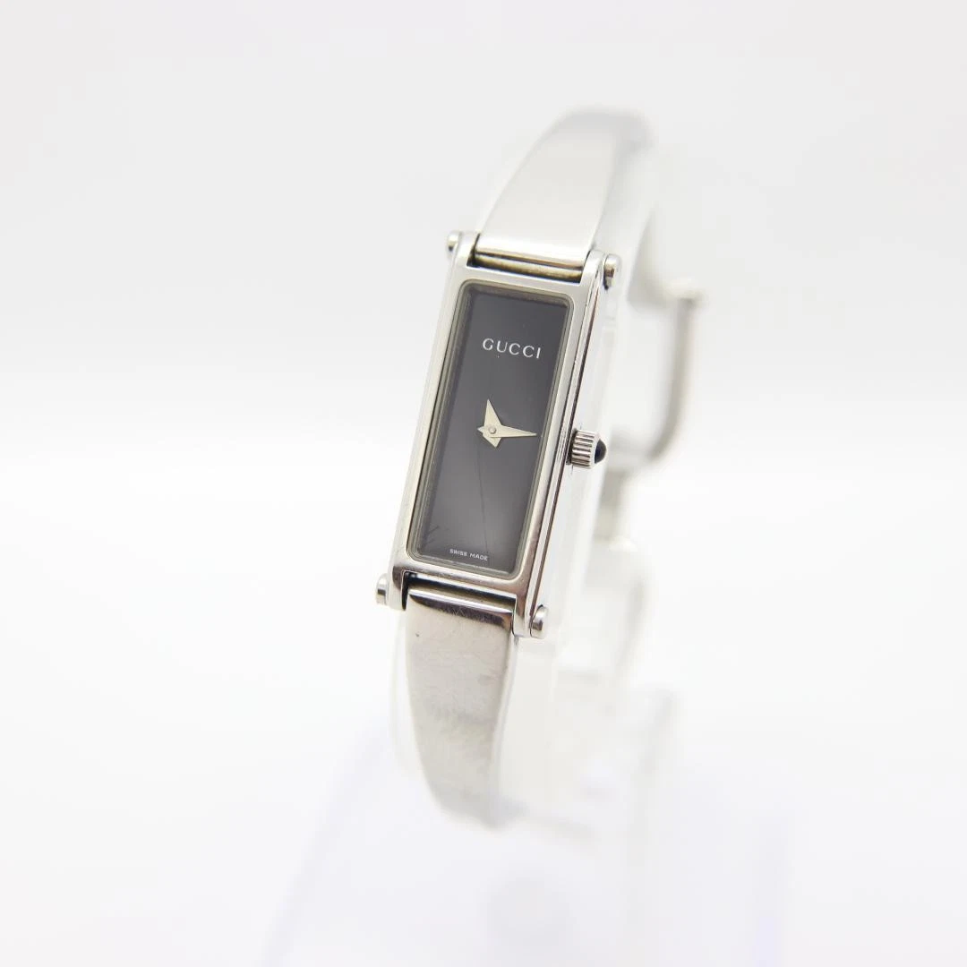 Montre femme Gucci 1500L occasion quartz vintage noir x boîtier argent 12 mm 