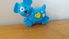 Fisher Price 1996 juguete azul para perro hace ruido cuando se mueven las piernas