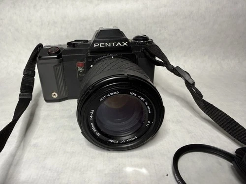 Pentax A3000 camera and  Sigma zoom lens 70-200 4-5.6 works
