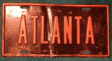 VINTAGE AUTOMOBILE TAG ATLANTA GEORGIA STEEL FRONT LICENSE PLATE BLACK/ ORANGE