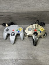 2 Nintendo 64 controllers for parts or repairs
