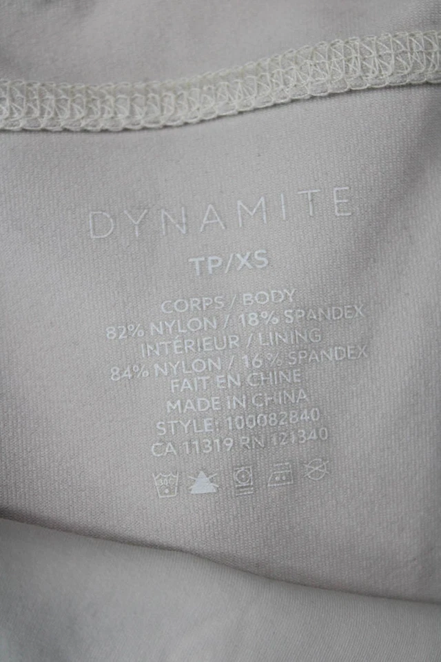 Mono deportivo Dynamite para mujer con correa cruzada espalda abierta beige talla XS Foto 4 de 4