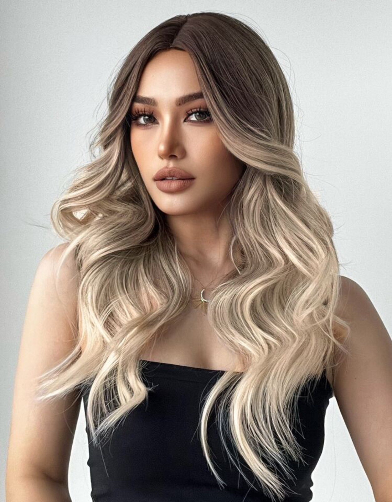 Perruque blonde synthétique longue pour masquer une perte de volume