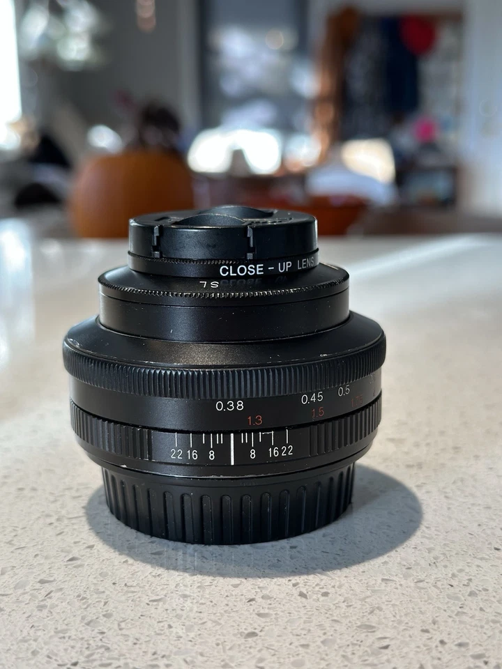 Voigtlander Ultron 40mm f/2 SL ii N para Canon EF con capucha y adaptador macro Foto 3 de 4