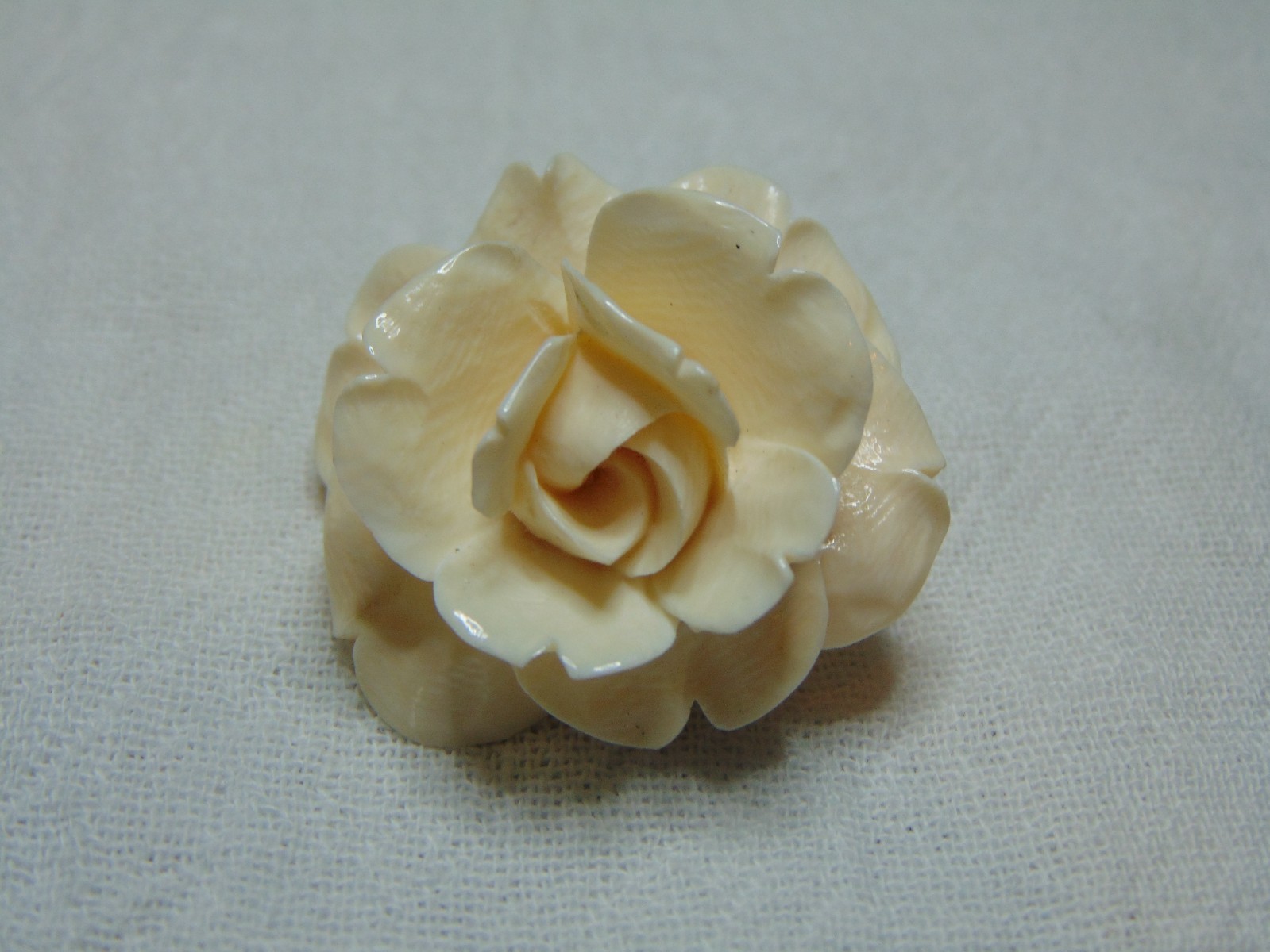 vintage carved rose brooch Krementz?