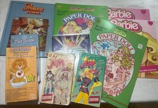 Barbie Jem CareBears lata 80-te Lot Book, VHS, Papierowa lalka, Album na naklejki Przedmioty kolekcjonerskie
