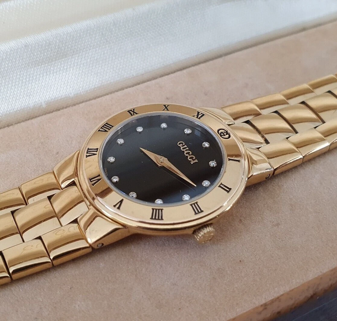 Montre femme Gucci 3300.2L plaqué or 18 carats avec index diamant (A249)