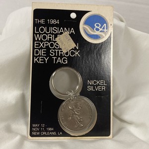 1984 New Orleans LA World Fair Exposition Die Struck Key Tag Nickel Silver NIP
