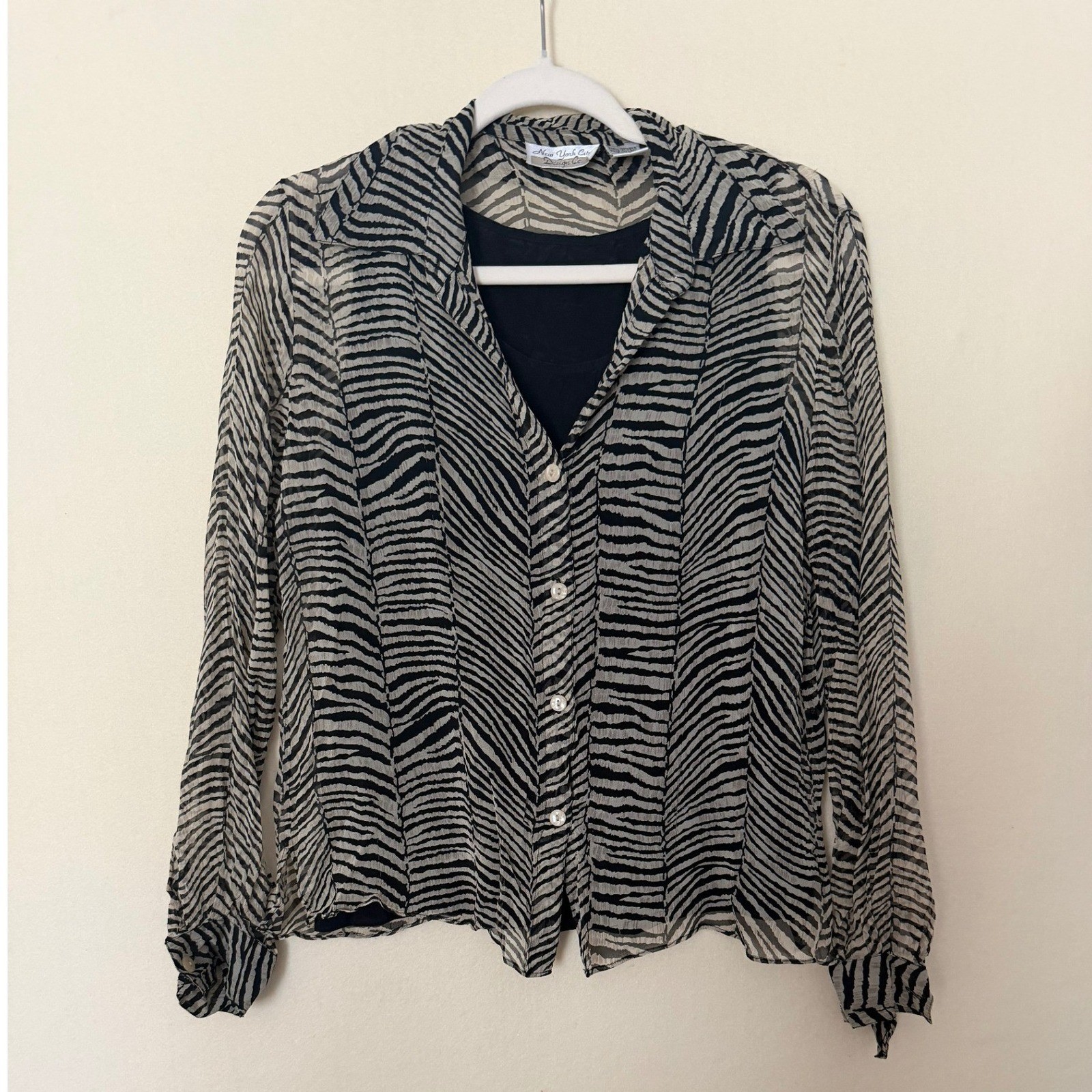 Tan and black silk blouse with zebra print button down