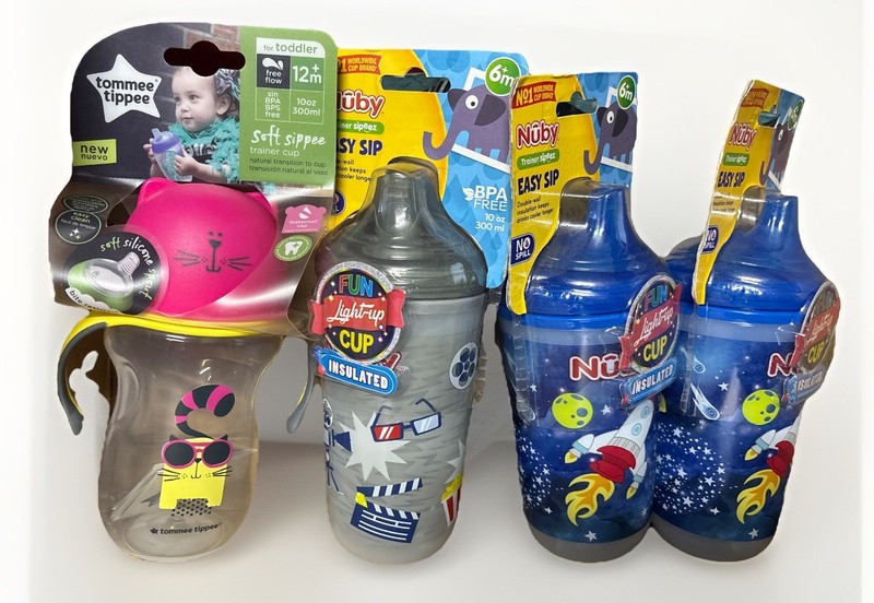 3Nuby easy sip light up  cup 6+ months &  one Nuby 12 plus months sippy cup