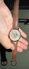 World Map Dial Quartz Analog Watch Gold Stain...
