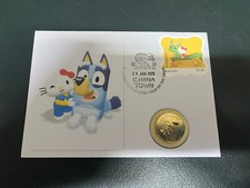 (500) Bluey & Hello Kitty (Snake) - $ 1.00 Bluey coin + 1.50 stamp (B)