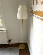 Gold Brushed Metal IKEA Skaftet Floor Lamp, White Pleated Shade
