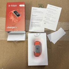 Fitbit Charge 6 Activity Tracker - Champagne Gold Case / Coral Band.