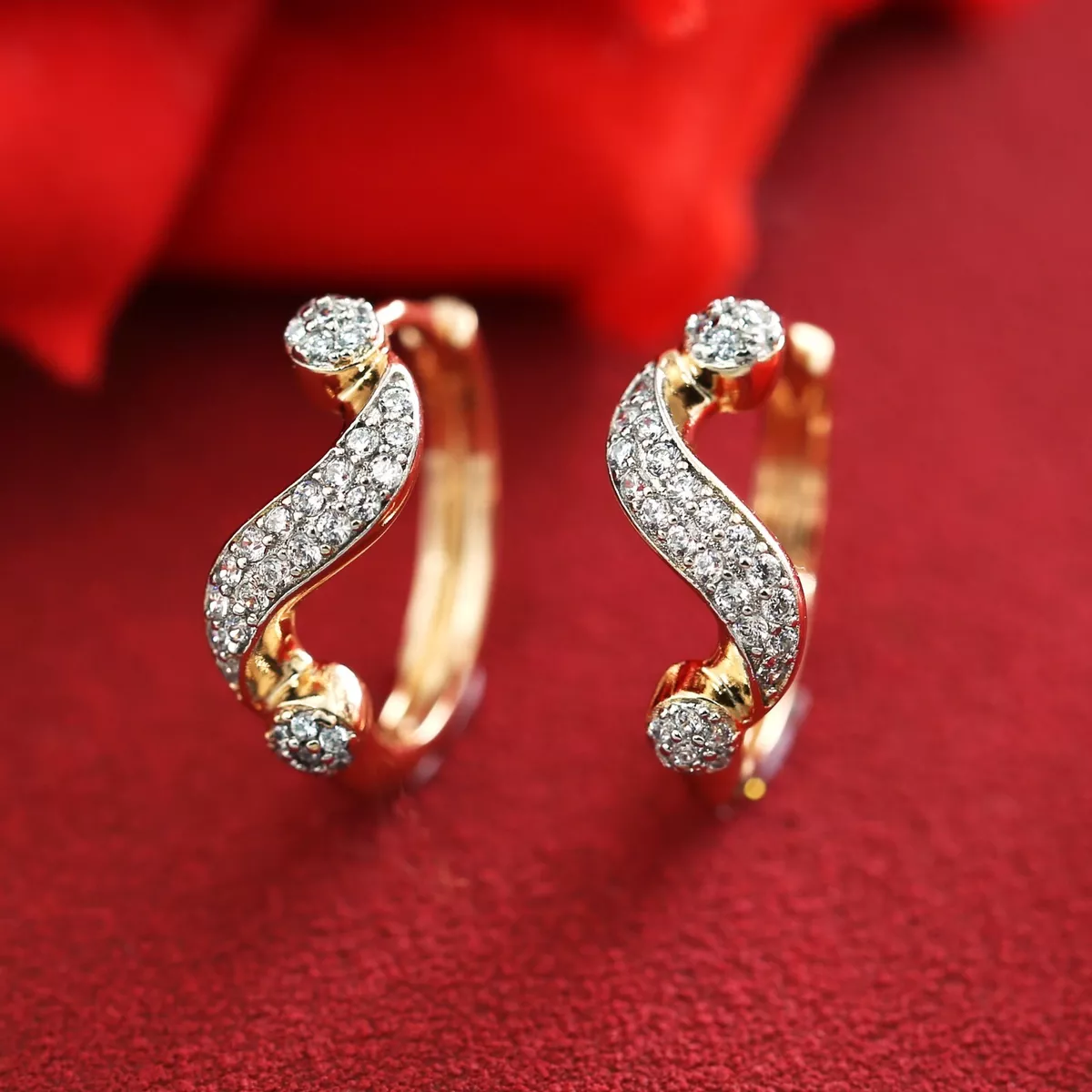 Elegant waves shop hoop earrings