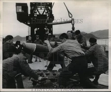 1951 Press Photo Crew loads a 16 inch gun aboard the USS Missouri. - nemo00097