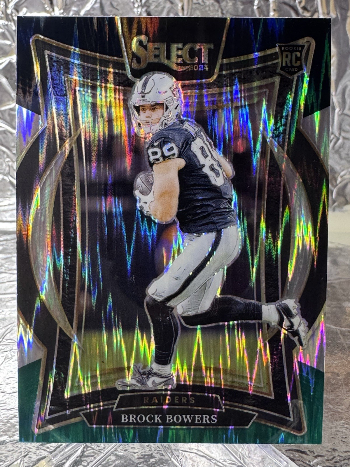 2024 Panini Select - Concourse Brock Bowers #31 Black & Green Shock Prizm (RC)
