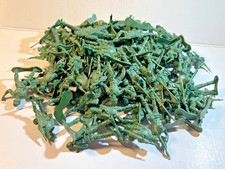 Lot of 80 plastic green Army soldiers ready for combat. Various poses as shown.