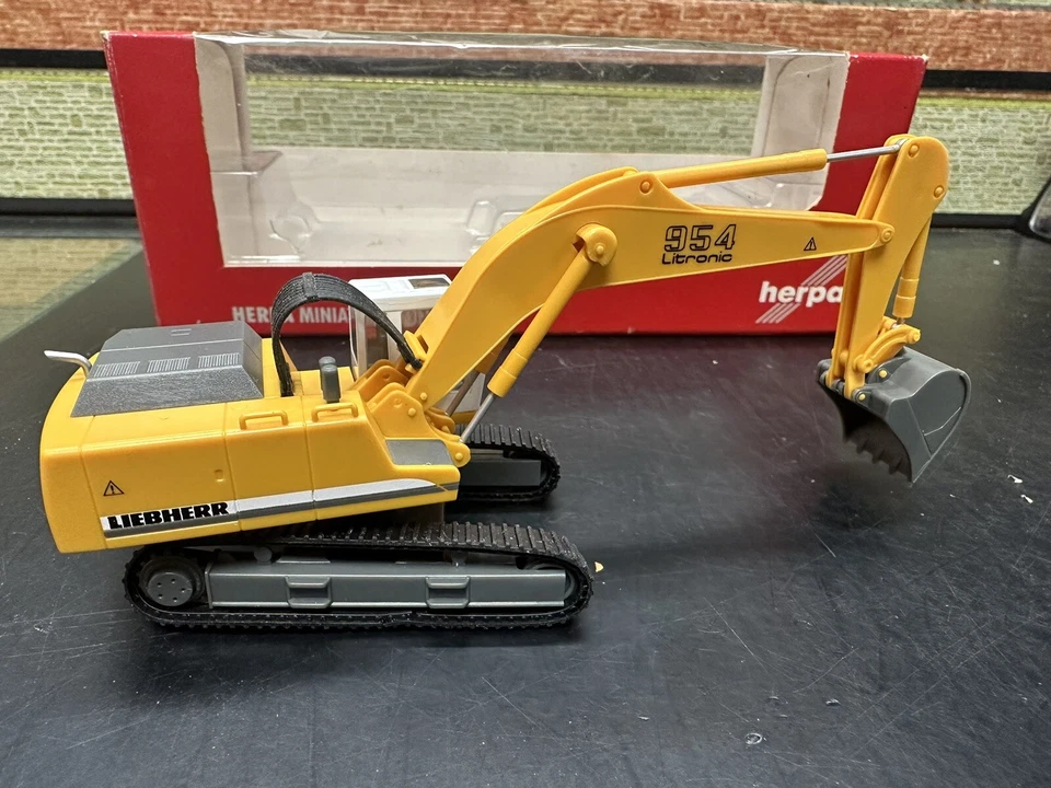 Trenino elettrico h0 escavatore cingolato Liebherr 954 Herpa 1:87 nuovo - Immagine 2 di 4