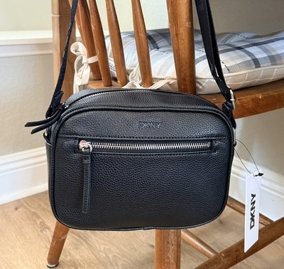 dkny black leather crossbody backpack Women's Chaya MESH LOGO Bag in Black/Black discover two inner pockets that keep your essentials organized and easily accessible DKNY Women's Zoie Camera Bag