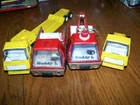 2 Tonka Tractors 1 Low boy trailer 1 Buddy L fire truck and 1 tow truck