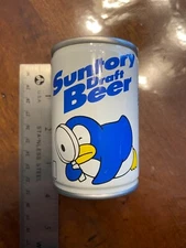 Suntory draft beer with penguin empty can