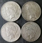1922, 1922, 1923 D, and 1923 S $1 Peace Silver Dollars
