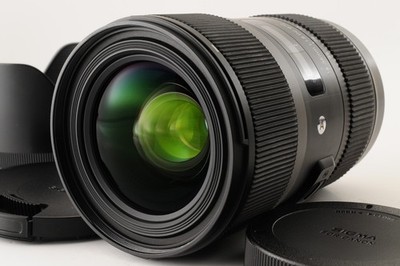 [Fast neuwertig mit Haube] Sigma 18-35 mm F/1.8 DC HSM Objektiv für Canon...