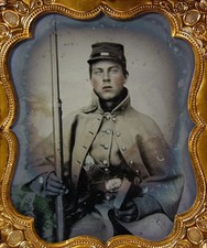 1860s DOUBLE ARMED CIVIL WAR SOLDIER AMBROTYPE PHOTO WITH RIFLE & REVOLVER