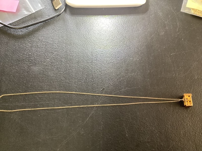 18” Long 14kt. Gold Necklace w/14kt. Gold Cage Holding Dice Charm  (2.6 grams)