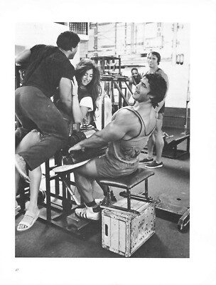 1970s Bodybuilder Calf Raises Arnold Schwarzenegger out of focus in background
