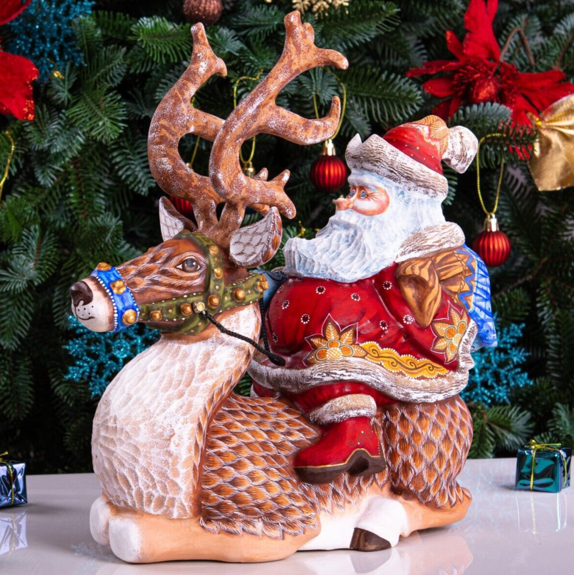 Wooden Hand Carved Santa Figurine riding a Reindeer , Christmas home decoration