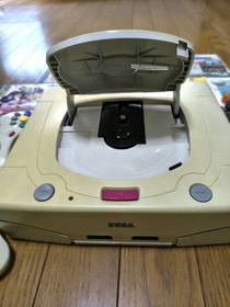 Sega Saturn body with 2 controllers and 7 game software