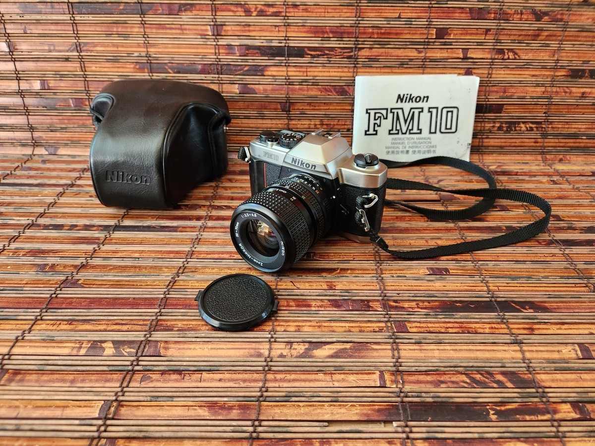 Nikon FM10 35mm SLR Camera, 35-70mm Lens, Case, Instructions