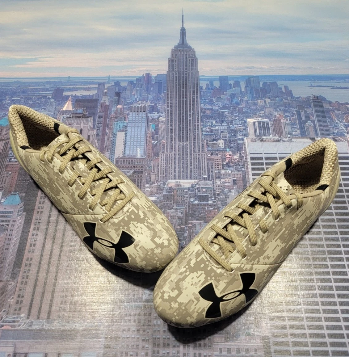 Under armour camo best sale cleats for sale