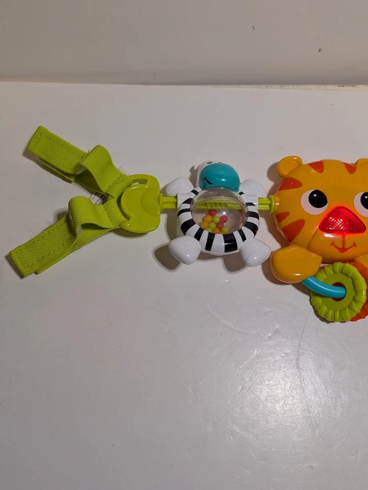 Bright Starts Take Along Tiger Zebra Asiento de Coche Portador Actividad Juguete Barra Ocupada Foto 4 de 4