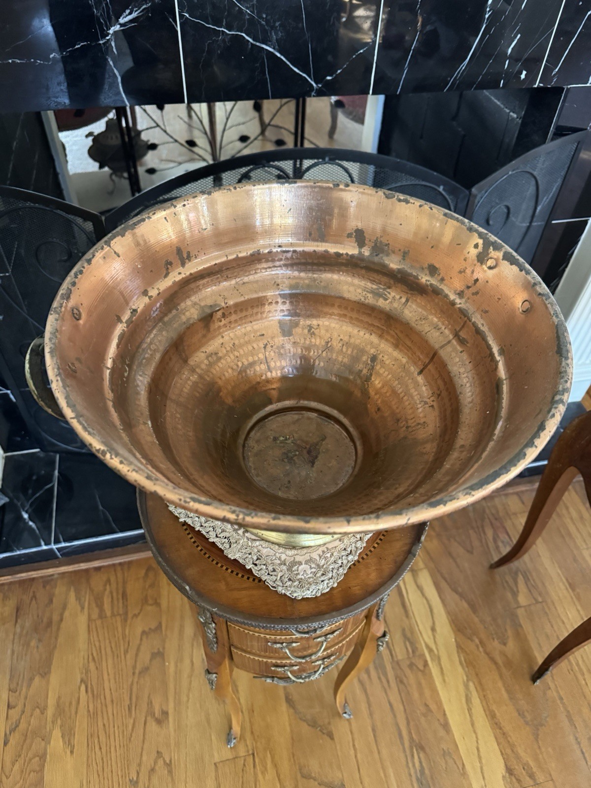 vintage footed copper planter, also known as a jardiniere or urn, brass handles