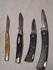 4 Buck Knives #424-425C-303-379. — photo 1