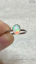  177B- .70ct Genuine Ethiopian Welo Opal set in a Size 6 Sterling Silver Ring